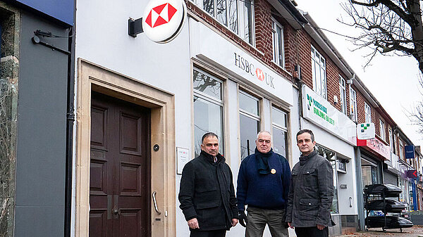 Raj Sood, Andy Daer and David Eldridge outside the threatened HSBC
