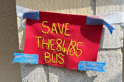 84/85 Bus Campaign banner