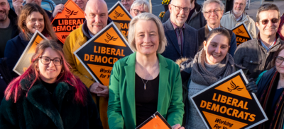 Claire Young surrounded by a group of Lib Dem campaigners