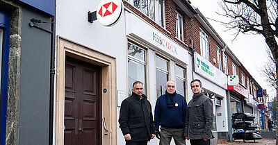 Raj Sood, Andy Daer and David Eldridge outside the threatened HSBC