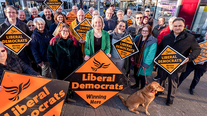 Claire Young surrounded by a group of Lib Dem campaigners